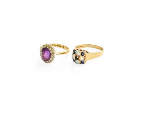 An 18 Carat Gold Amethyst and Diamond Cluster Ring, finger size M1/2; and A 9 Carat Gold Sapphire and Opal Cluster Ring, fing