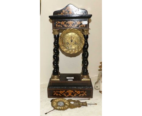 A French Portico Mantel Clock, late 19th century and later, barley twist supports, (later dial to movement) 47cm high