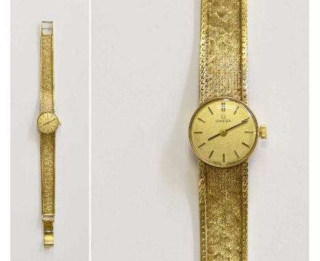 A Lady's 9 Carat Gold Omega Wristwatch, manual wound lever movement, silvered dial with baton markers, Omega 9 carat gold int