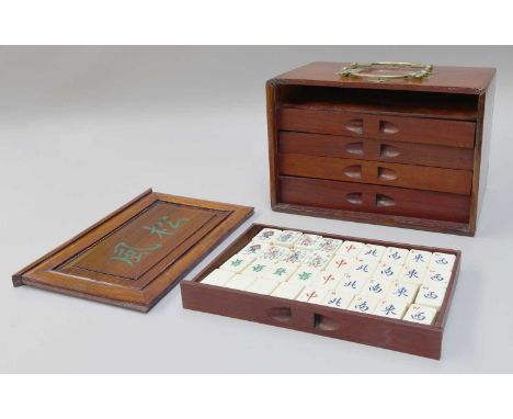 A Cased Mahjong SetComplete set The case with a little wear and a slight crack to left hand side