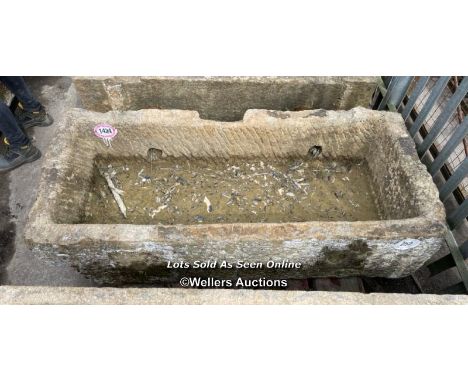 *A LARGE GRITSTONE QUARRY TROUGH, 45CM (H) X 170CM (L) X 76CM (W)