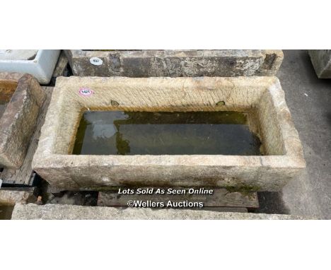 *A LARGE GRITSTONE QUARRY TROUGH, 45CM (H) X 170CM (L) X 76CM (W)