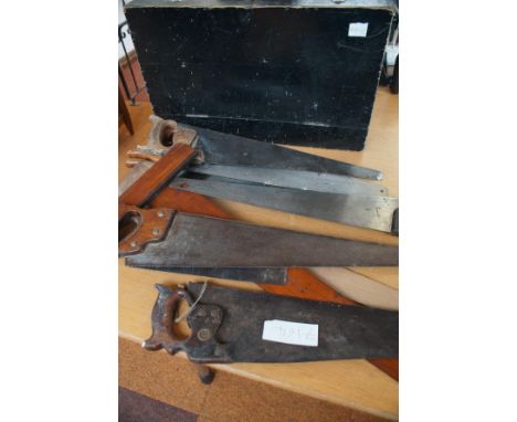 Carpenters toolbox with a quantity of early saws 