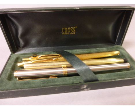 Four vintage pens to include Parker and Cross