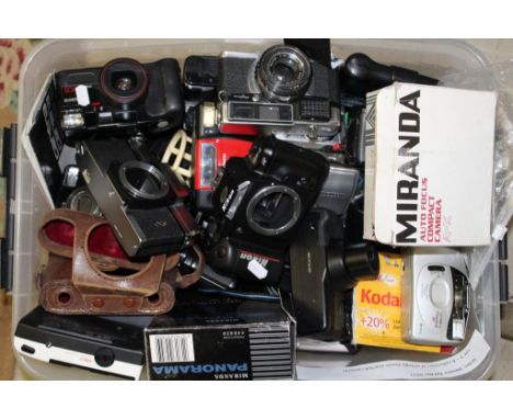 A collection of vintage 35mm and SLR cameras