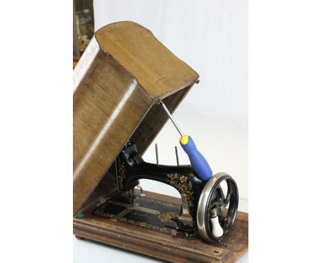 Wooden cased vintage Frister & Rossman sewing machine
