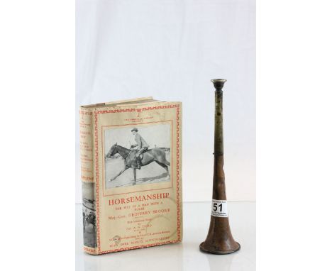 Vintage copper & brass hunting horn and a vintage book "Horsemanship" with dust cover