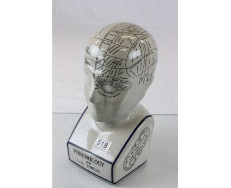 A large phrenology ceramic head
