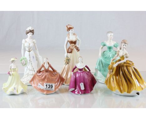 Seven vintage Coalport figurines