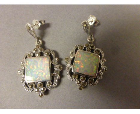 Pair of silver, marcasite and opal paneled earrings