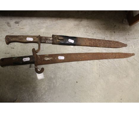 Late 19th/early 20th century bayonet with scabbard and German butcher bayonet with scabbard