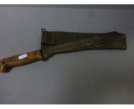 Military marked machete dated 1965, with canvas scabbard