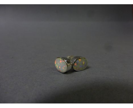 Pair of silver and opal ear studs