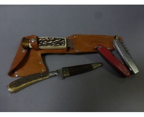 Four vintage Knives to include an Axe/ Bowie knife type combination