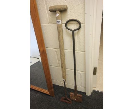 Two unusual iron brands, one with wooden handle and marked "R Marcon C + H Green" possibly for brick marking 