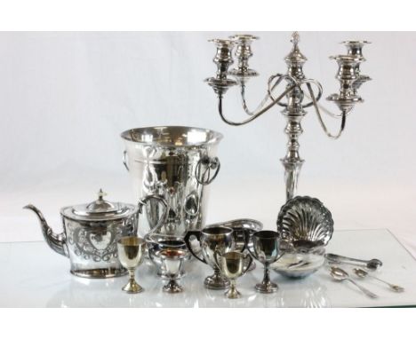 Quantity of Silver Plate including Four Branch Candlearbra, Ice Bucket, Three Piece Tea Service, Scallop Butter Dish, Trophie