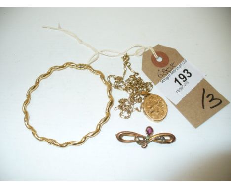 An 18ct Gold wavy bangle , together with a 9ct gold locket and chain and an amethyst and seed pearl brooch. (3) weight combin