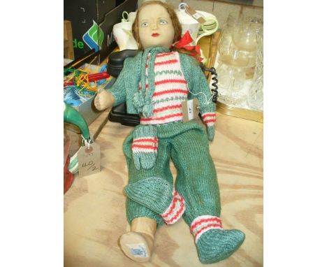 A Chad Valley vintage felt doll.