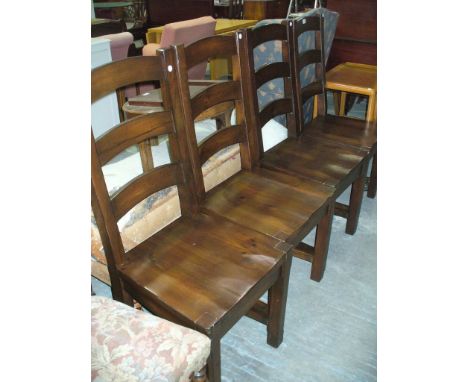 4 Modern hardwood ladder back kitchen chairs.