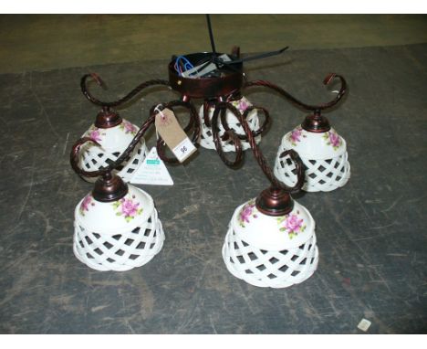 A Painted metal five branch ceiling light fitting with ceramic open work lattice shades. (5 LT BZ )

*Please note that this l