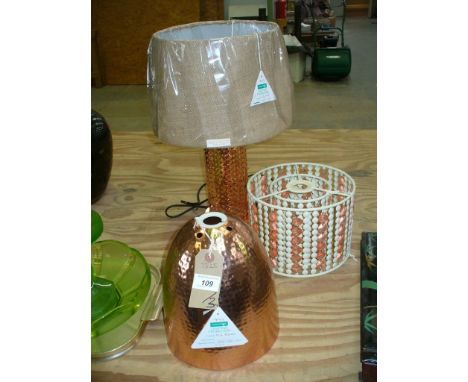 A Hammered copper pendant light shade, a pierced copper cylindrical table lamp and a beaded pendant light shade (3)

*Please 