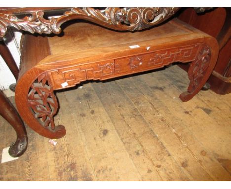 20th Century Chinese hardwood coffee table with pierced scroll ends, a brass inlaid octagonal table on a folding base, an Edw