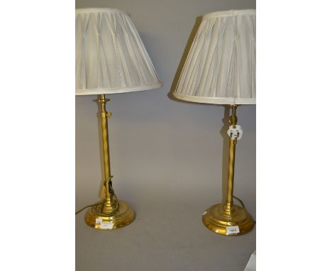 Pair of adjustable brass table lamps with shades 