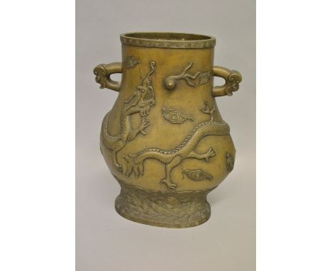 Large Chinese bronze two handled vase relief decorated with dragons, signed with seal mark to base, 13ins high 