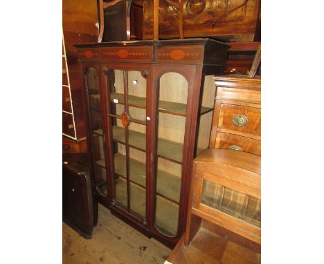 Edwardian mahogany and inlaid two door display cabinet on splay supports 