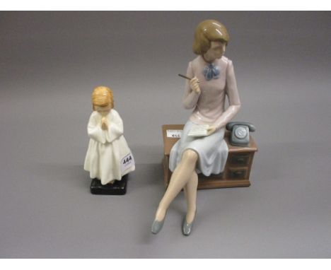 Royal Doulton figure, ' Bedtime ' together with a Nao figure of a lady seated on a desk 