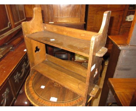 Small Liberty style oak two shelf bookrack with pierced sides 