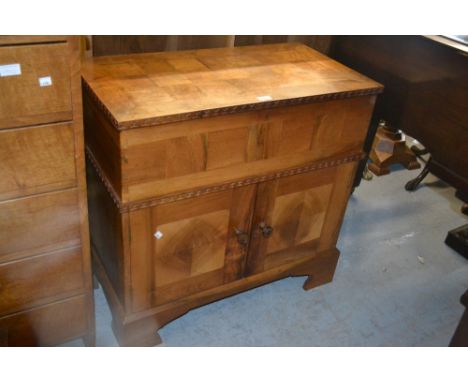 Small mid 20th Century parquetry inlaid walnut side cabinet with a hinged cover above two drawers on bracket feet 