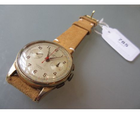 Swiss 18ct gold cased Chronograph wrist watch, the silvered dial with Arabic numerals, two subsidiary dials and center second