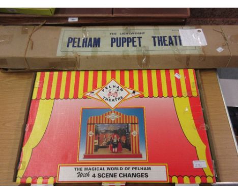 Early lightweight Pelham puppet theatre in original box, together with a later Pelham puppet theatre in original box with fou