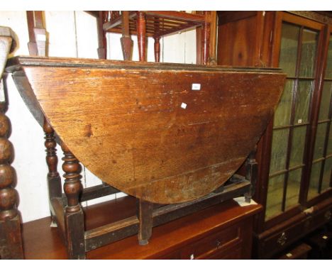 18th Century oak gate leg table with a single end drawer on baluster turned supports with moulded stretchers 