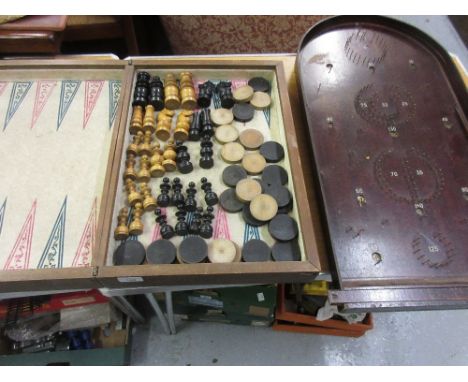 Large folding wooden chess and backgammon board, with late 19th or early 20th Century chess pieces and counters, together wit