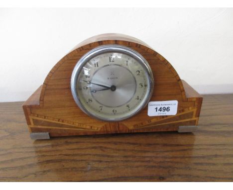 Art Deco walnut and inlaid dome shaped mantel clock together with a 19th Century ebonised mantel clock 