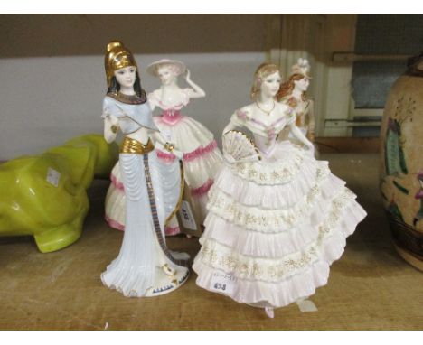 Coalport figure, ' Cleopatra ' and Royal Worcester figure,  ' Belle of the Ball ' with two other figuresSome minor chipping t