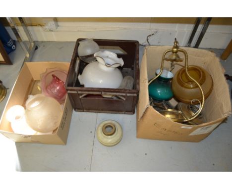 Three boxes containing a quantity of various 19th Century oil lamp parts including an enamel porcelain well, various glass sh
