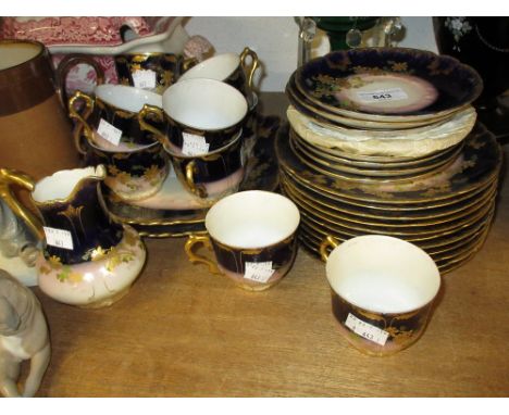 Limoges Goa floral decorated part tea service 