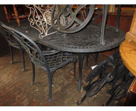 Modern painted alloy garden table, together with a set of eight matching elbow chairs and a parasolOverall in good condition,