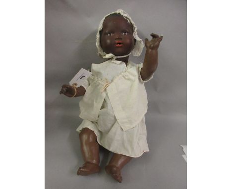 Armand Marseille Germany 351 / 8K bisque headed doll with a jointed composition body, wearing a white cotton bonnet and robe 
