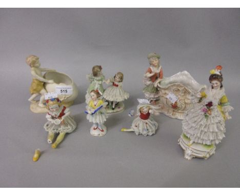 Royal Vienna porcelain vase in the form of a boy standing beside and egg, five various Continental porcelain figures of girls