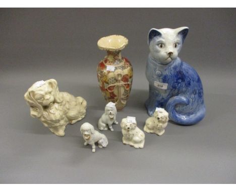 Two pairs of small Staffordshire type flat back figures of dogs, 19th Century Staffordshire figure of a dog, porcelain figure