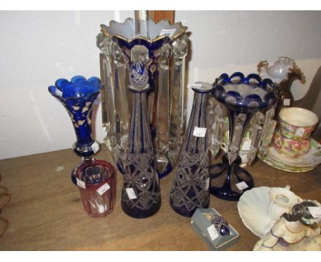 19th Century Bohemian blue overlaid clear glass lustre with gilded decoration together with a similar smaller lustre, a pair 