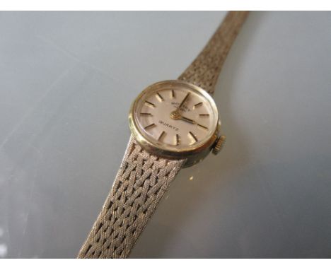 Ladies 9ct gold cased wristwatch by Rotary with an integral articulated bracelet17g total weight including movement 