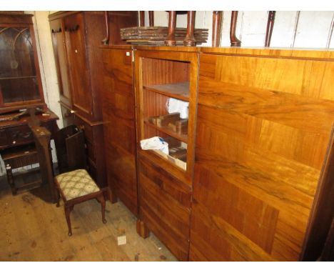 Mid 20th Century Continental figured walnut three section side cabinet, the centre with a door above five drawers flanked by 