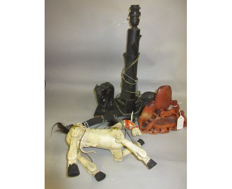 Carved hardwood lamp base in the form of a tree with an elephant, soapstone vase and a carved wooden puppet in the form of a 