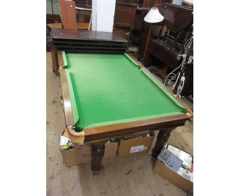 Early 20th Century mahogany quarter size snooker dining table by Riley, the removable four piece top above a moulded frieze a