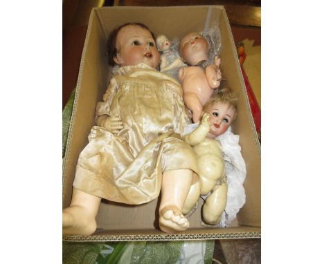 Small Armand Marseille bisque headed baby doll (at fault), another similar bisque headed doll (cracks to head) and another la